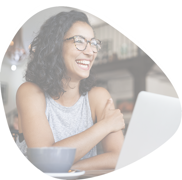 Smiling woman at a laptop